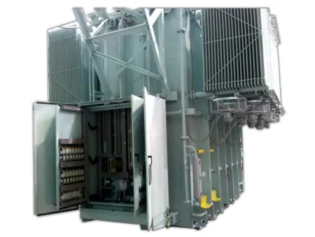 Control cabinet with its doors open, mounted on the side of a shunt reactor, showing terminal blocks and control devices